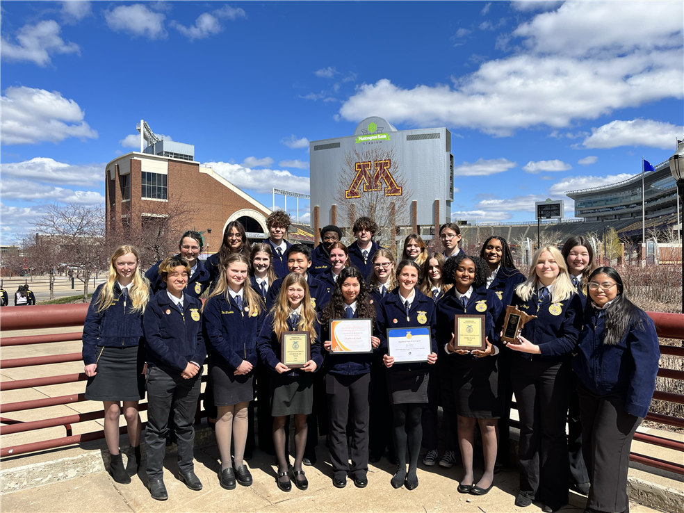 FFA members holding awards at the 2023 MN FFA State Convention